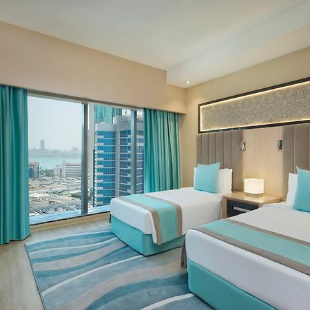 윈덤 도하 웨스트 베이 호텔 외부 사진 Deluxe Room