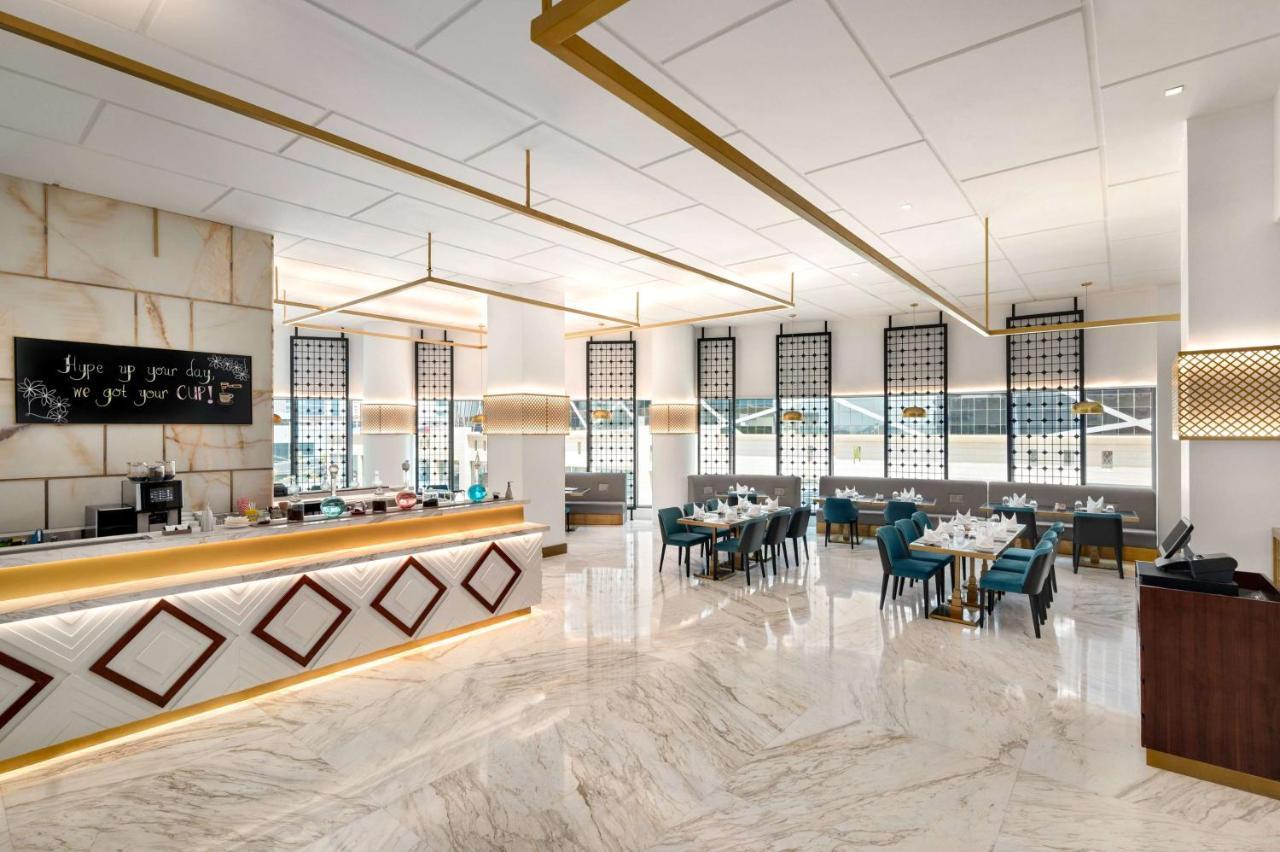 윈덤 도하 웨스트 베이 호텔 외부 사진 3D rendering of a restaurant