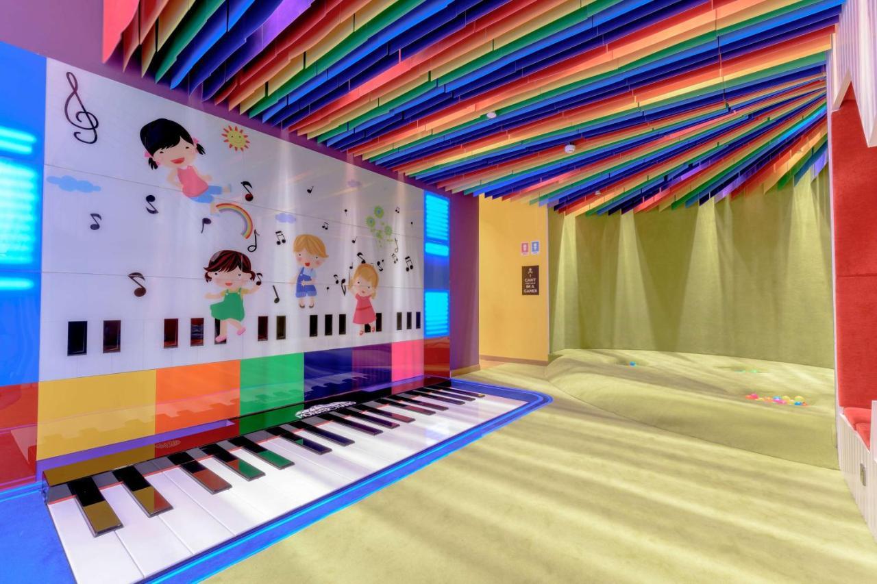 윈덤 도하 웨스트 베이 호텔 외부 사진 The Children's Museum of Oak Ridge